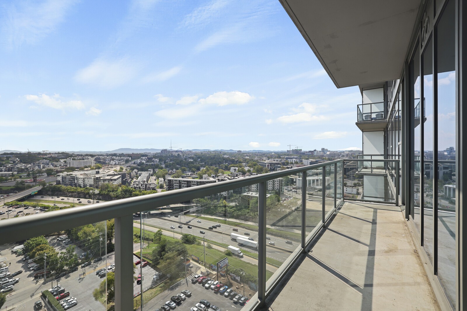 a view of city from a balcony