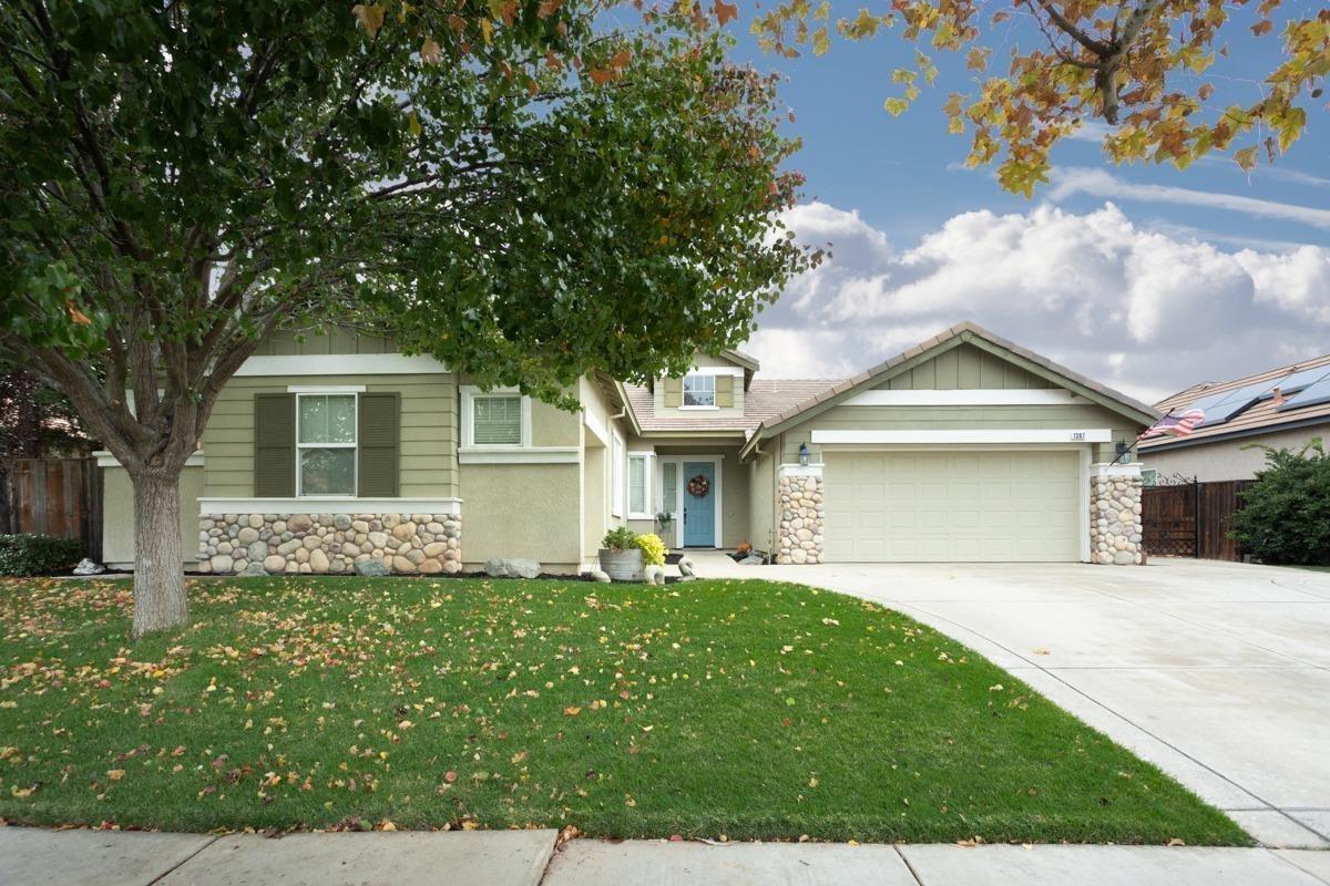 front view of a house and a yard