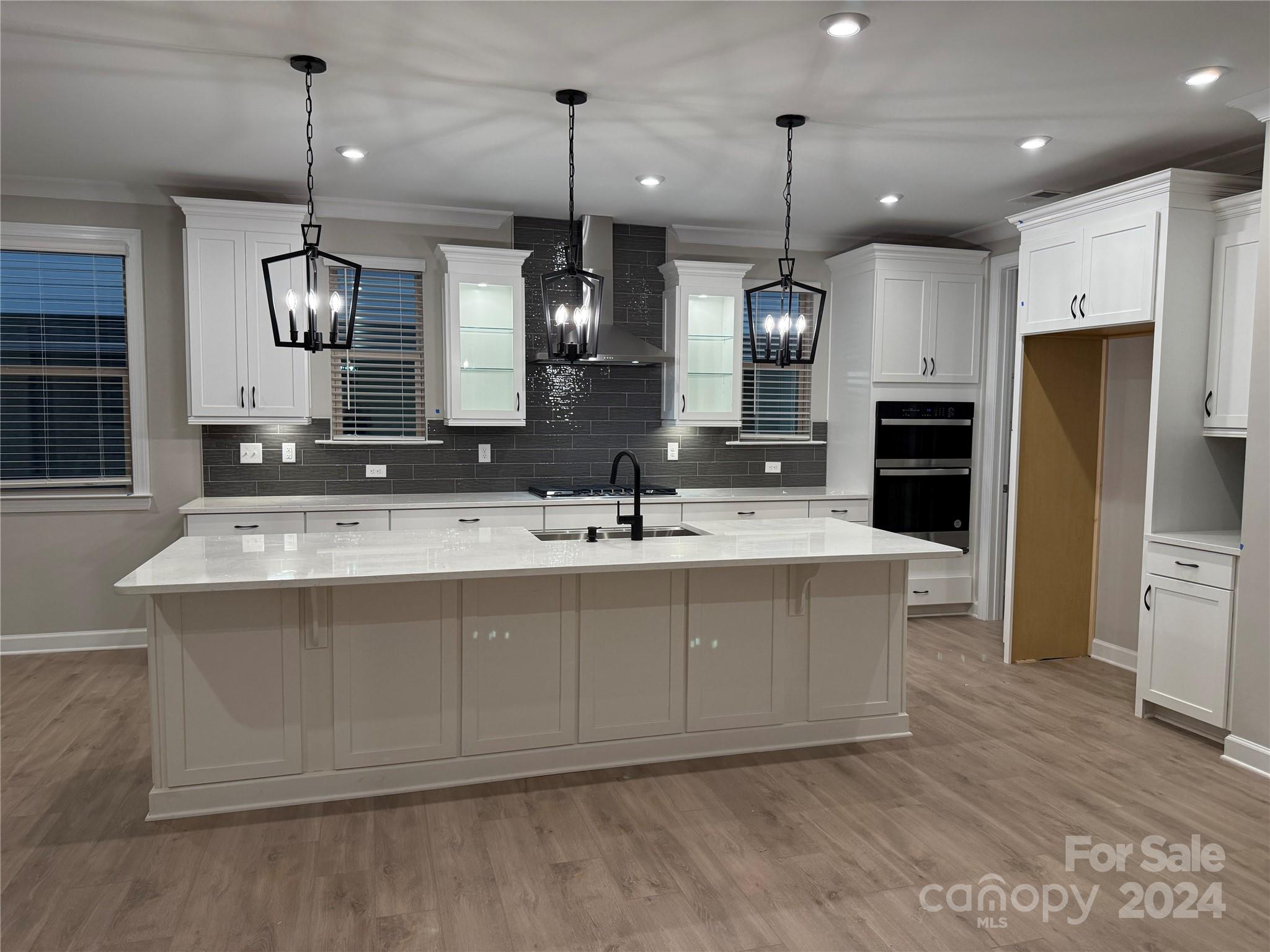 a bathroom with double vanity and a sink