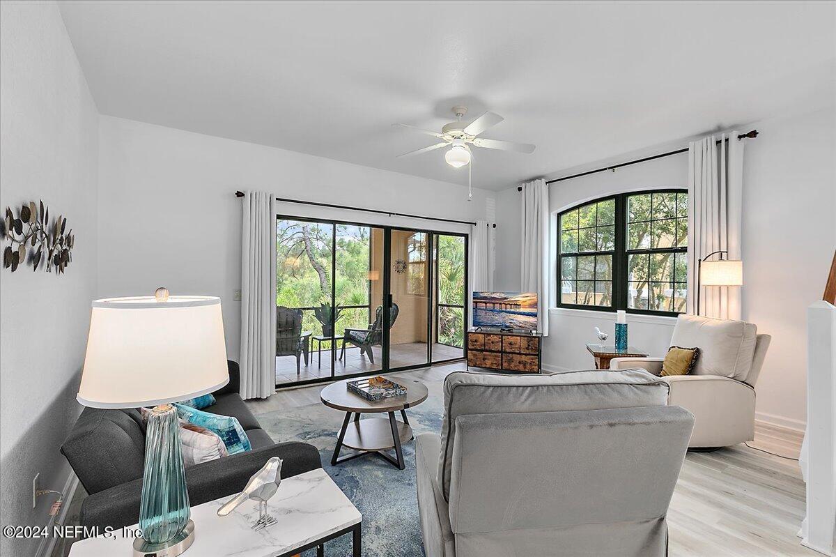 a living room with furniture and a window