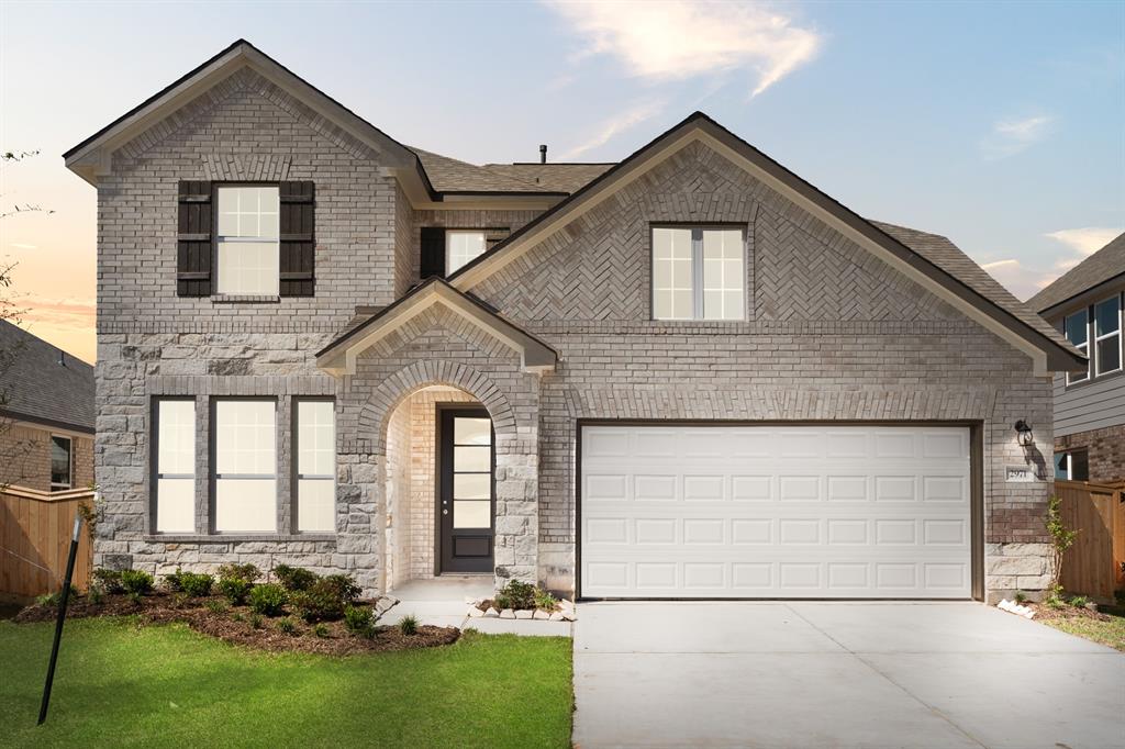 Welcome home to 2971 Golden Dust Drive located in the master planned community of Sunterra and zoned to Katy ISD.