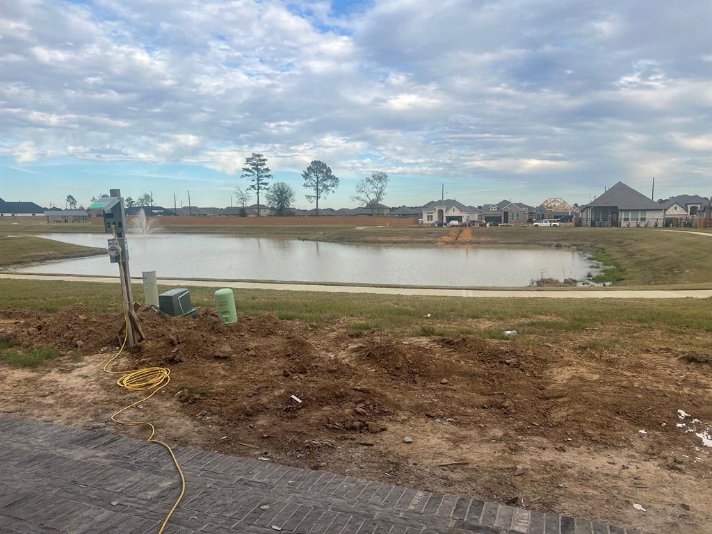 a view of a lake from a yard