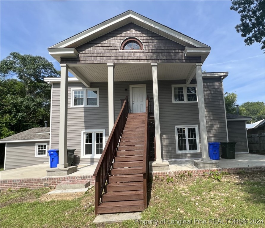 a front view of a house with a porch