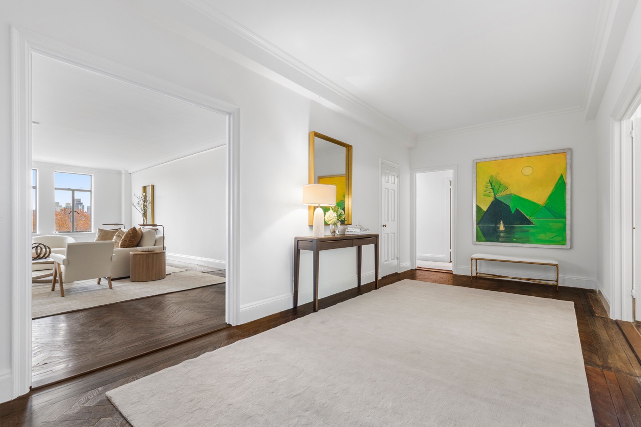 a view of living room with furniture and flat screen tv