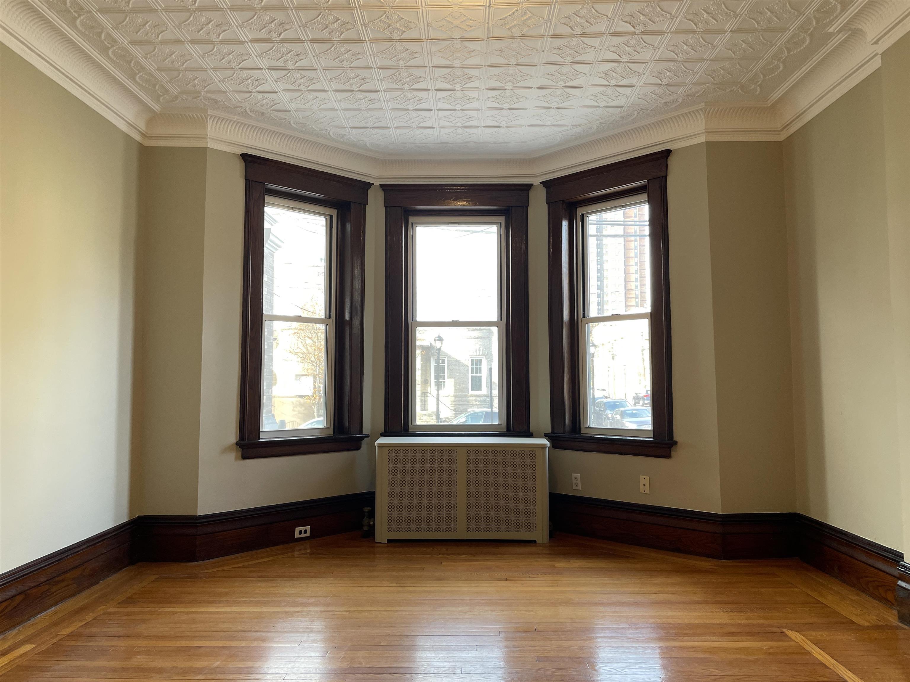 a view of an empty room and window