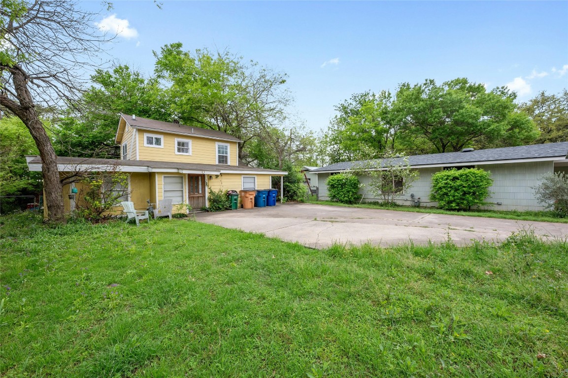 a view of house with outdoor space