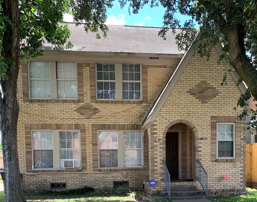 a front view of a house with stairs