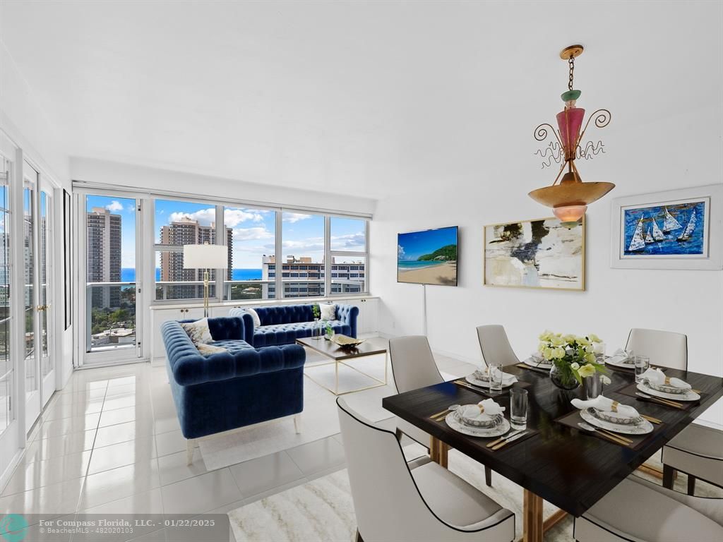 a living room with furniture and a table