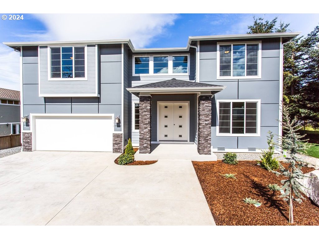 a front view of a house with a outdoor space