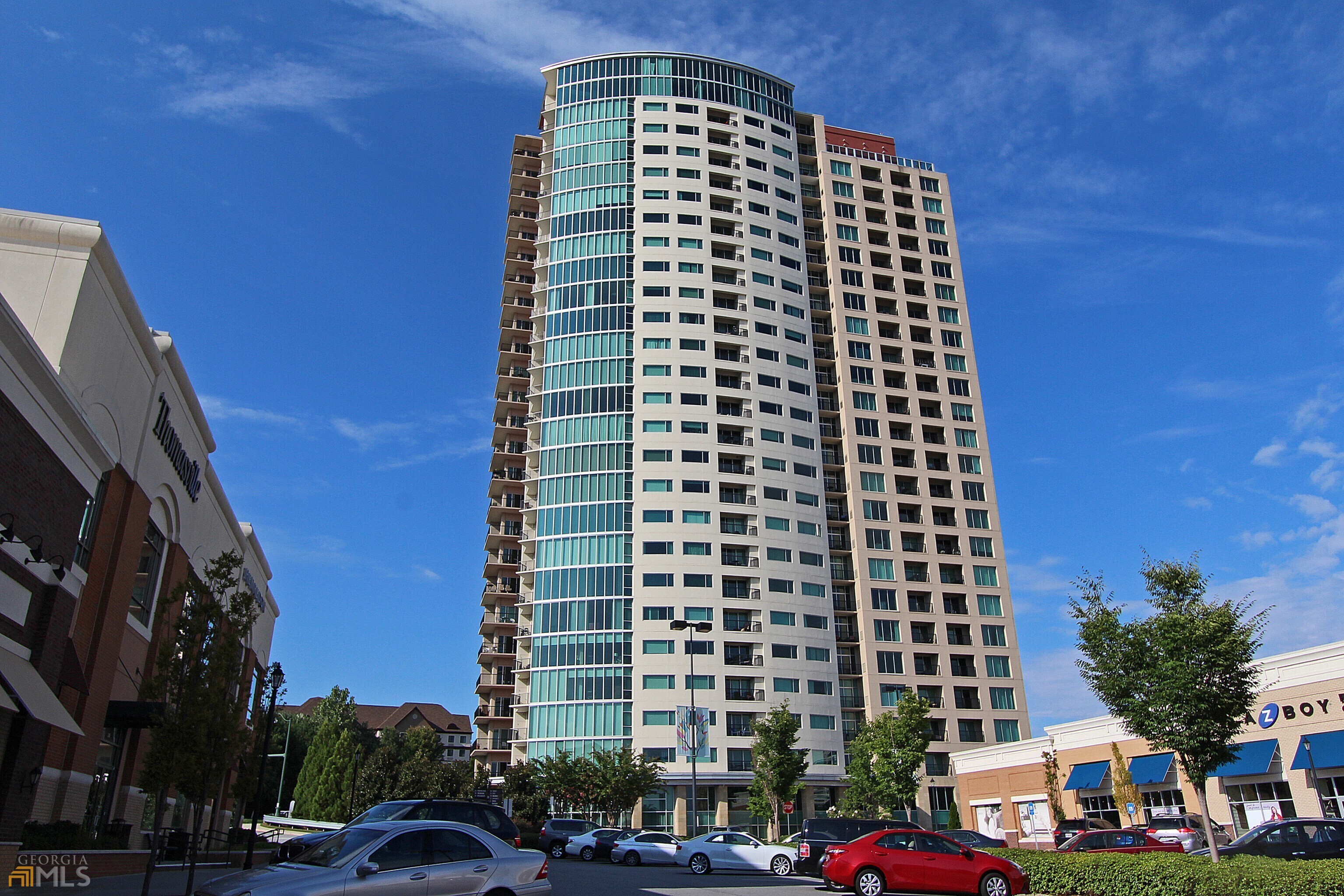 a front view of a building with a street