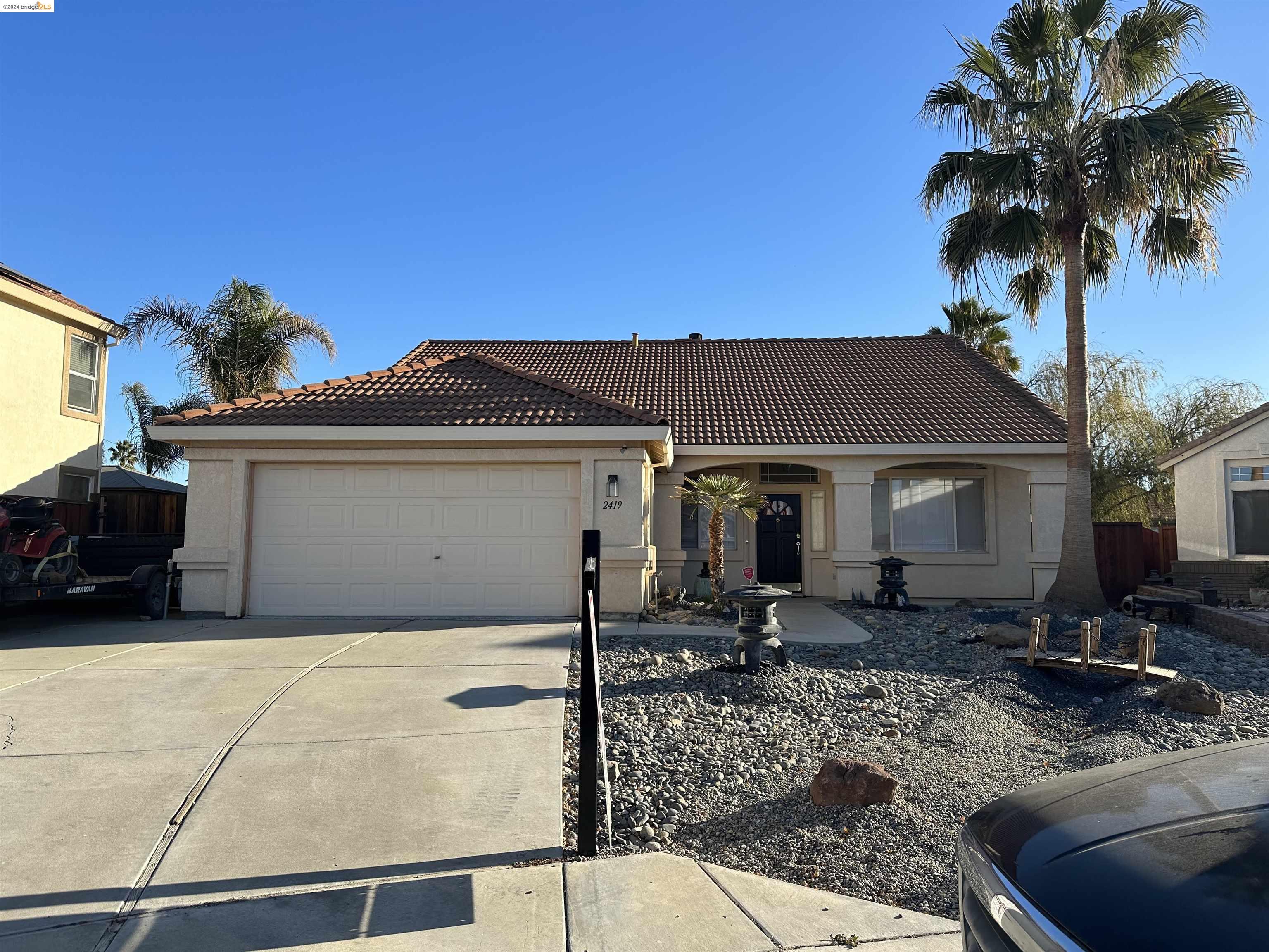 a view of a house with a patio