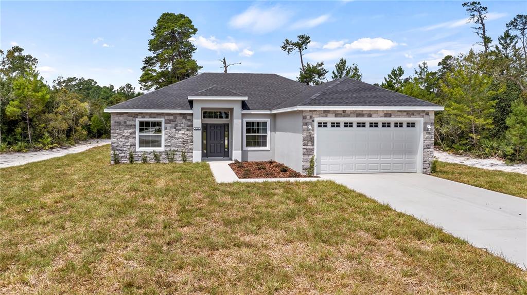 front view of a house with a yard