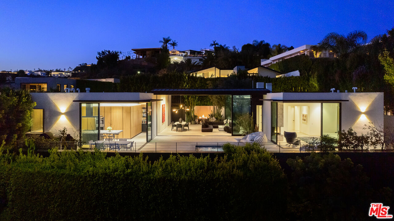 a view of a house with a ocean view