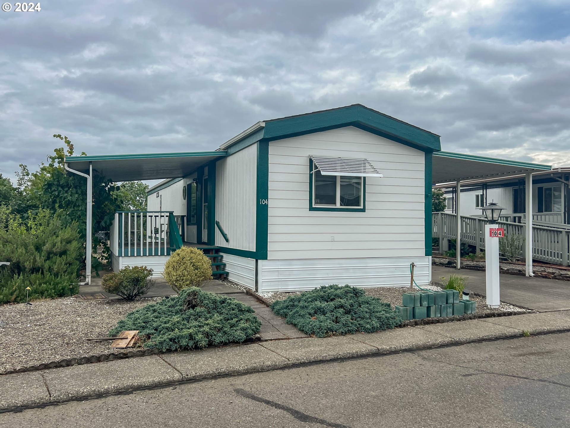 a front view of a house with garage