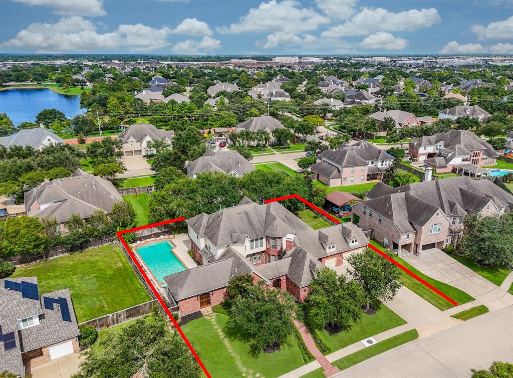 Welcome to 2303 Shady Cove Ct nestled in The Estates, a gated section of the popular master planned community of Shadow Creek Ranch in Pearland, TX!