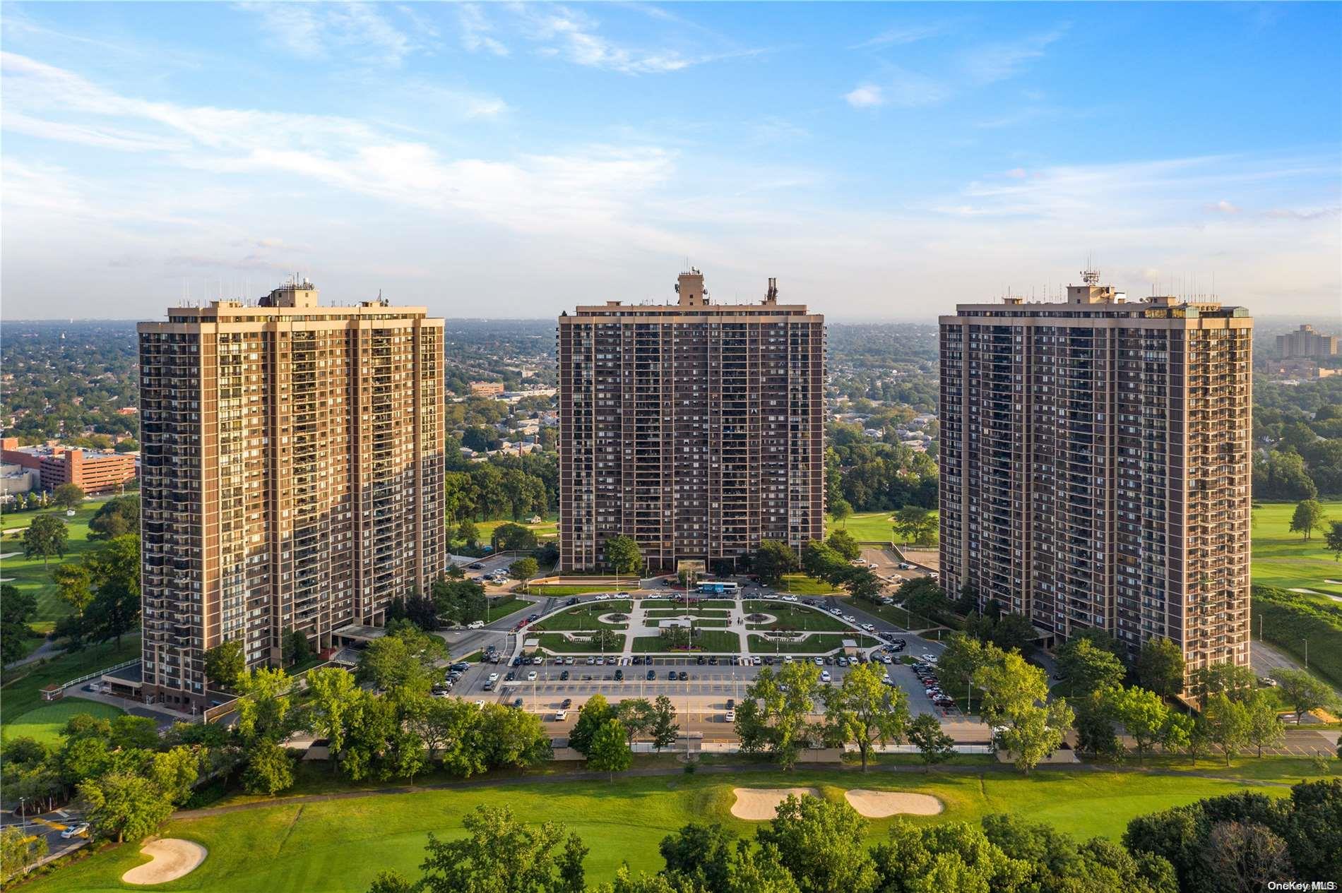 a view of a city with tall buildings