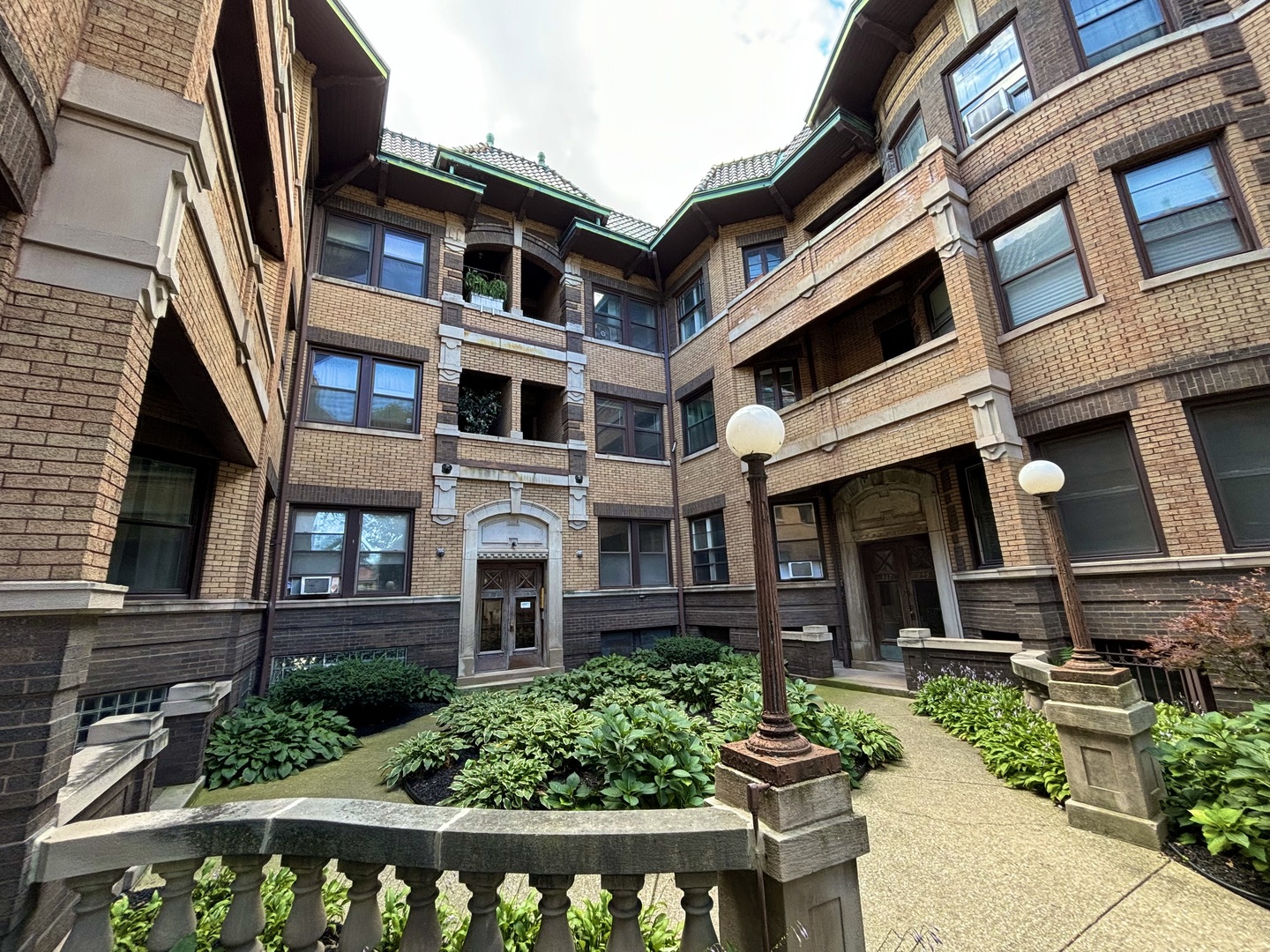 a front view of a multi story residential apartment building