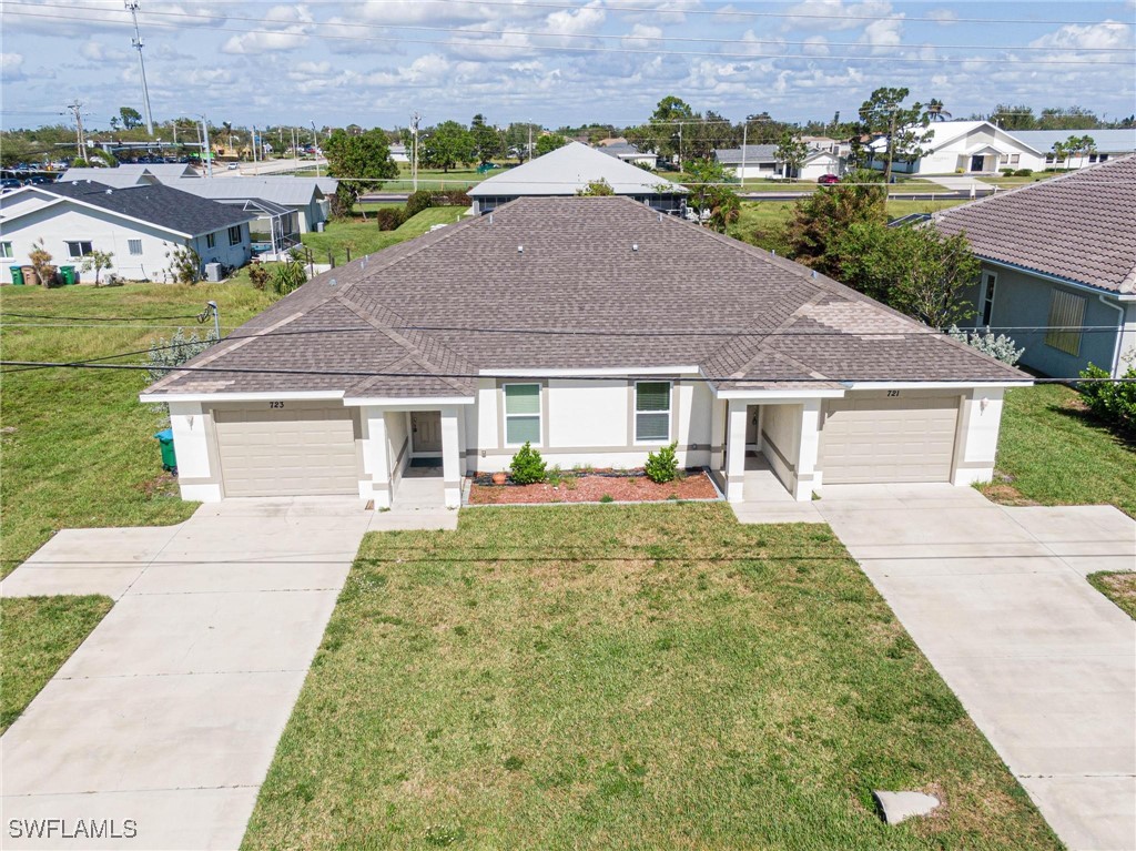 front view of a house with a yard