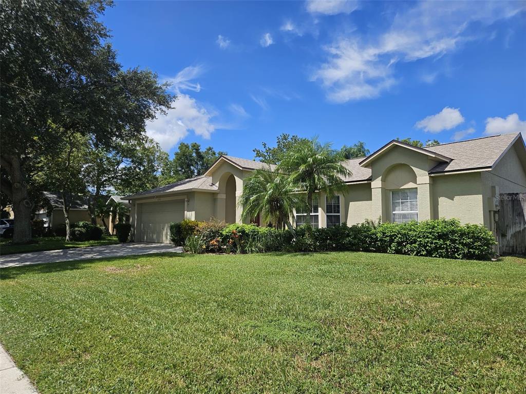 a view of a yard in front of house