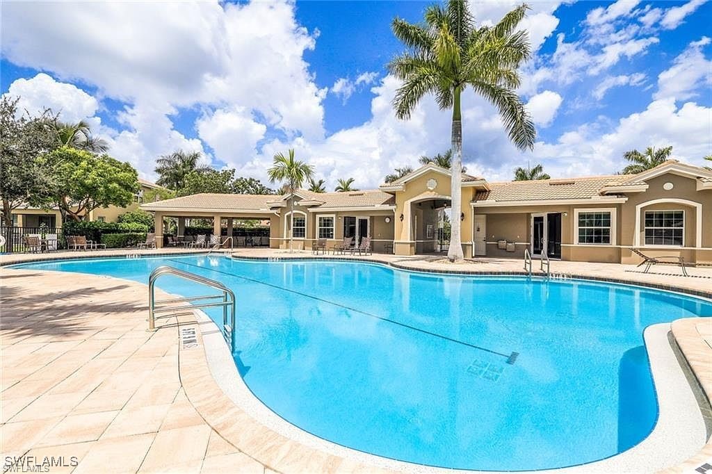 a view of a house with swimming pool