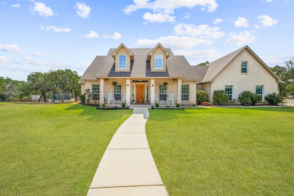 a front view of house with yard