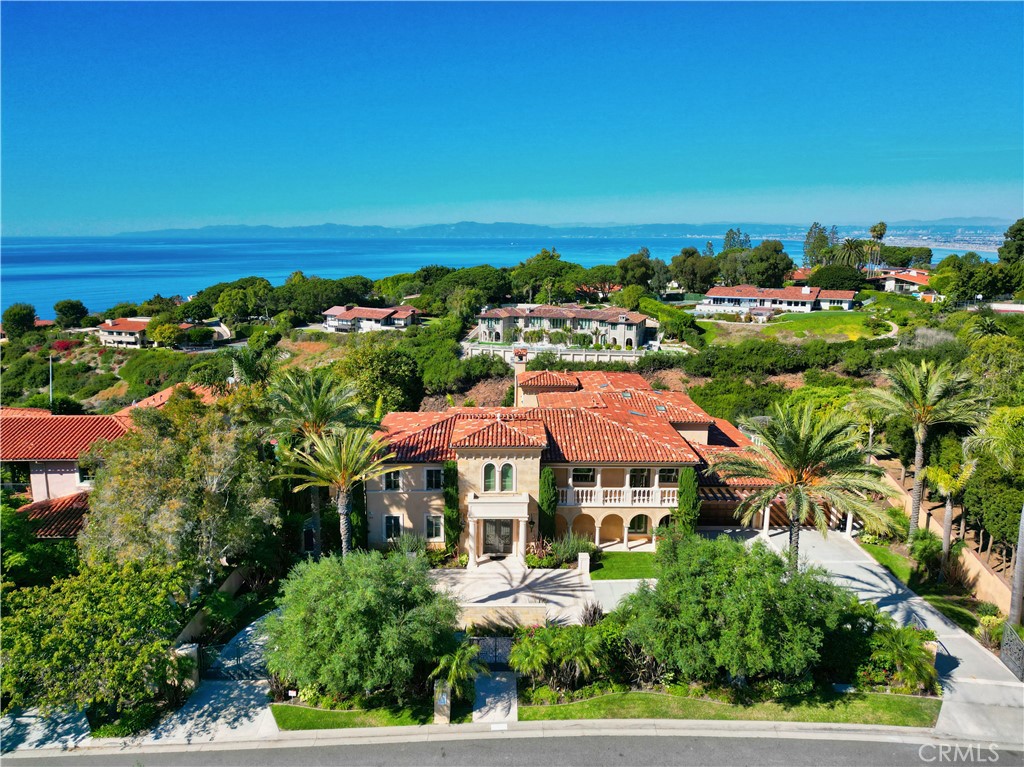 an aerial view of a house with a garden