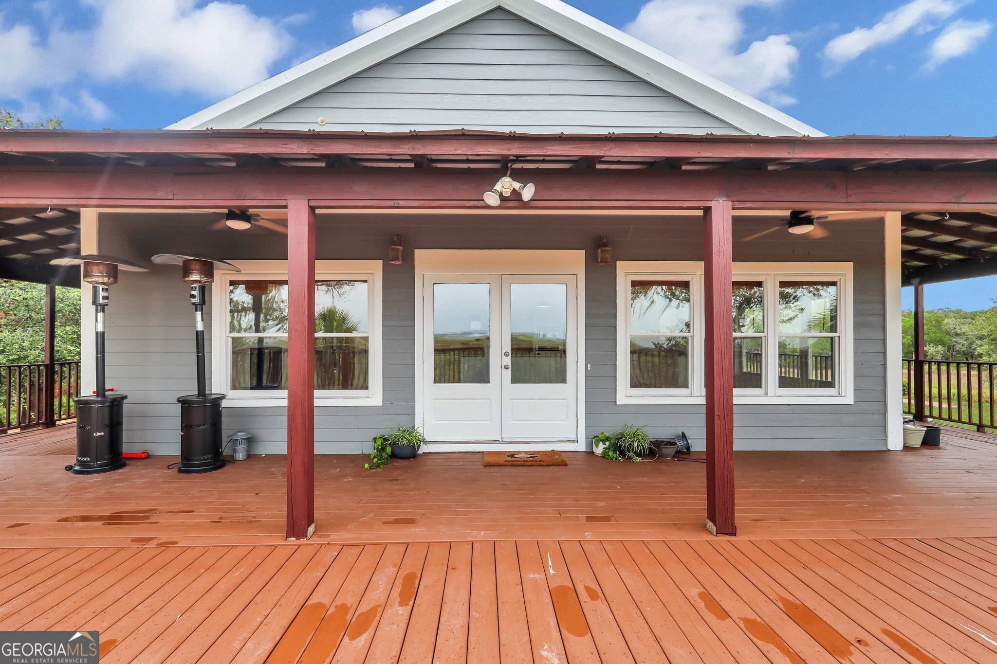 a front view of a building with a porch