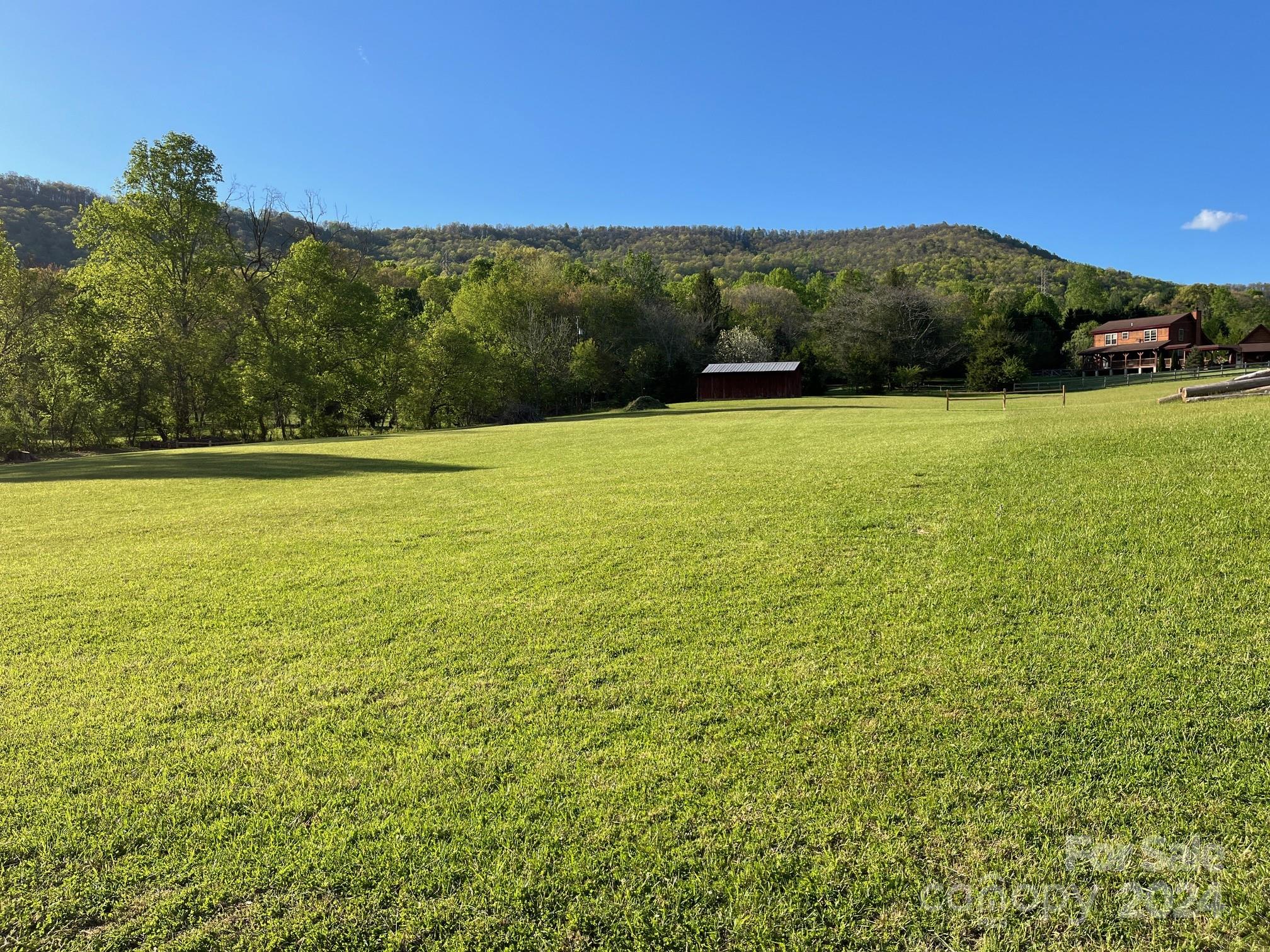 a view of an outdoor space and a lake view