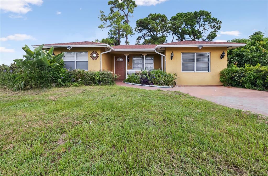 front view of a house with a yard