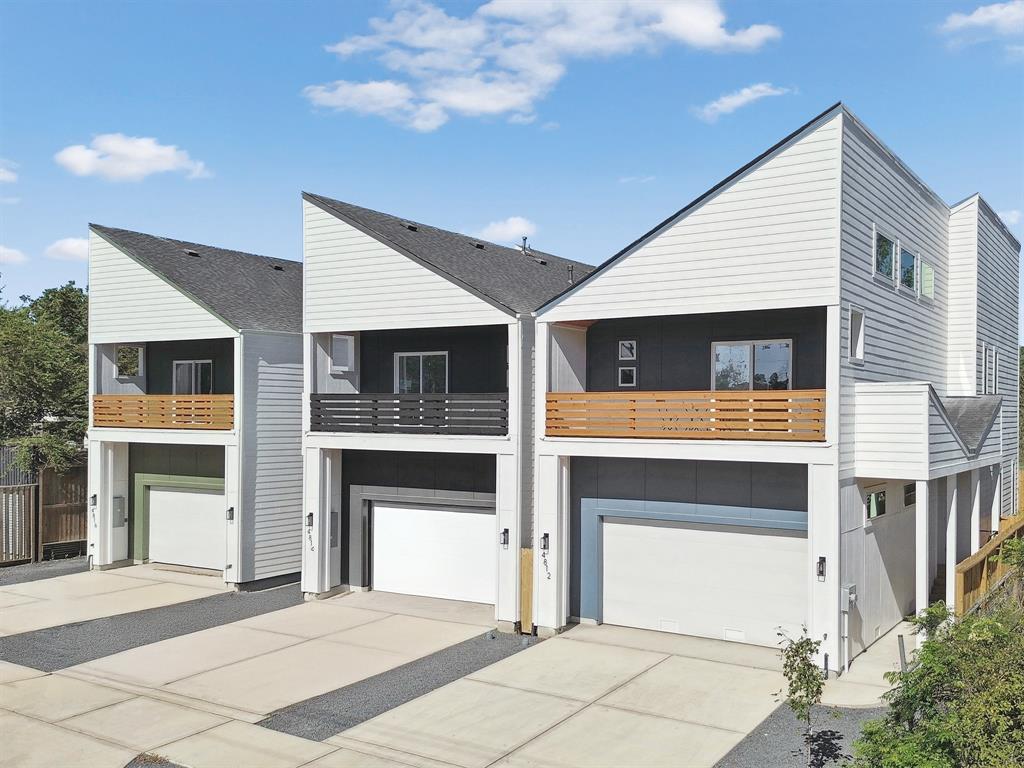 a front view of a house with a garage