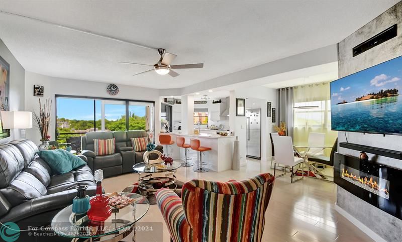 a very nice looking living room with furniture and a flat screen tv