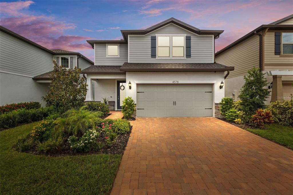 a house view with a garden space