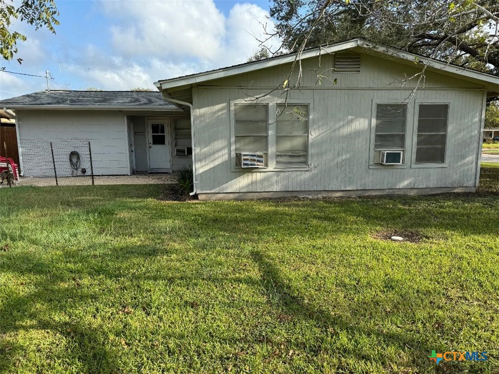 a house with garden in front of it