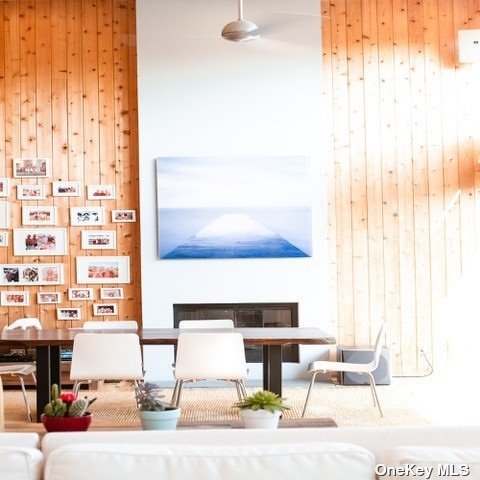 a living room with furniture and a lamp