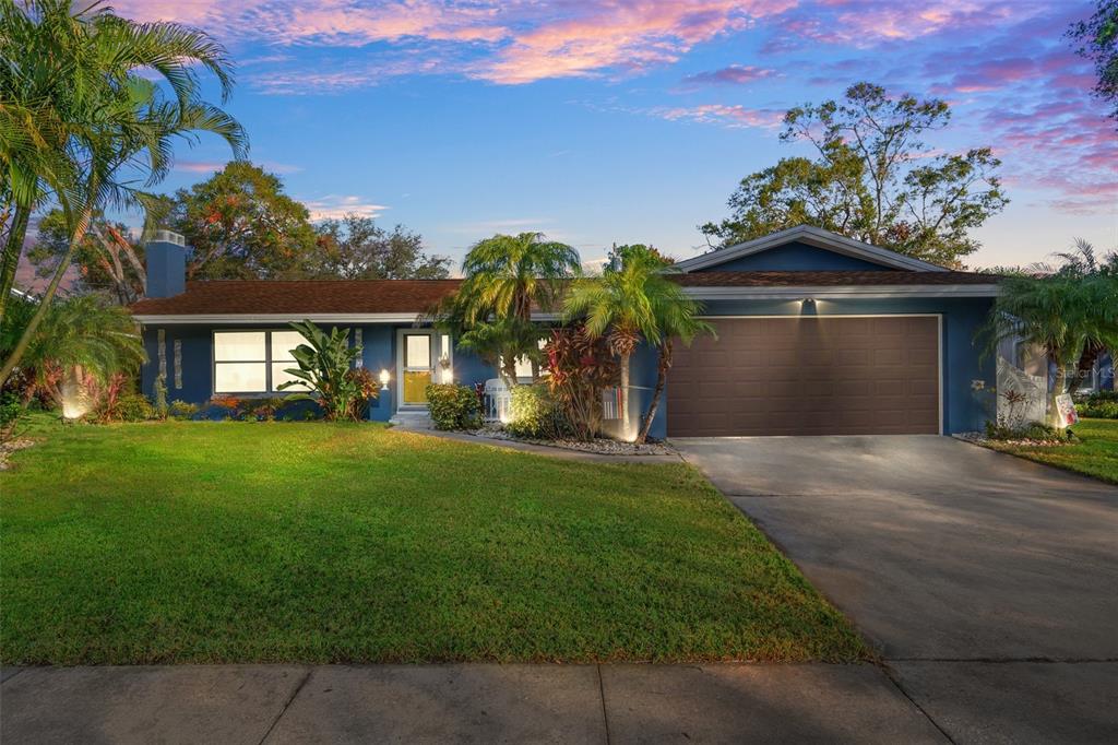 front view of a house with a yard