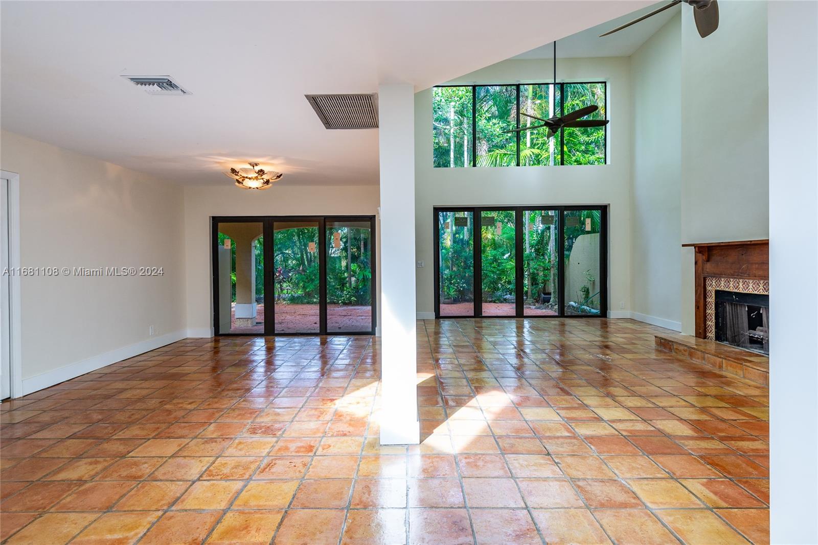 a view of an entryway with a garden