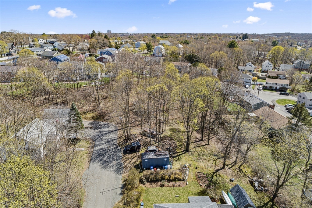 a view of residential houses with outdoor space