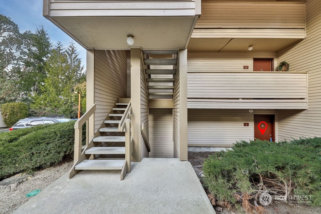 a front view of a house with garage