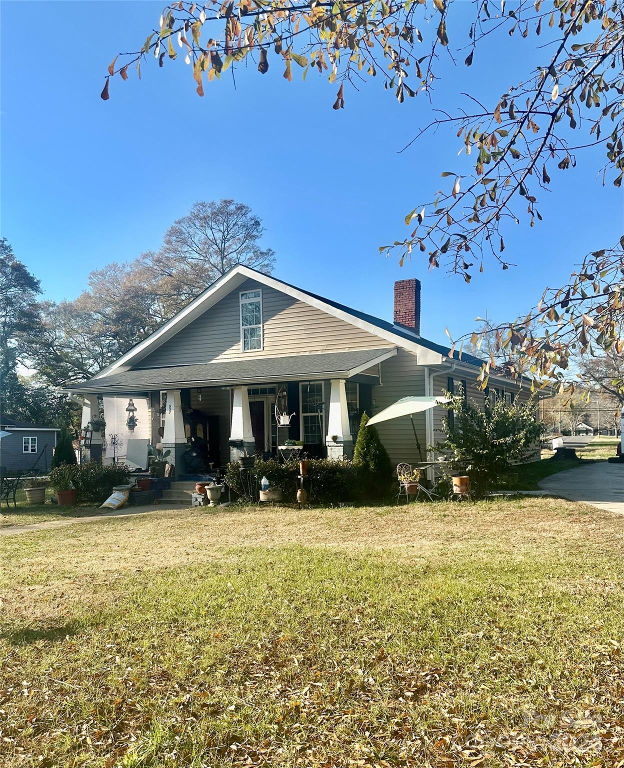 a front view of a building with a yard