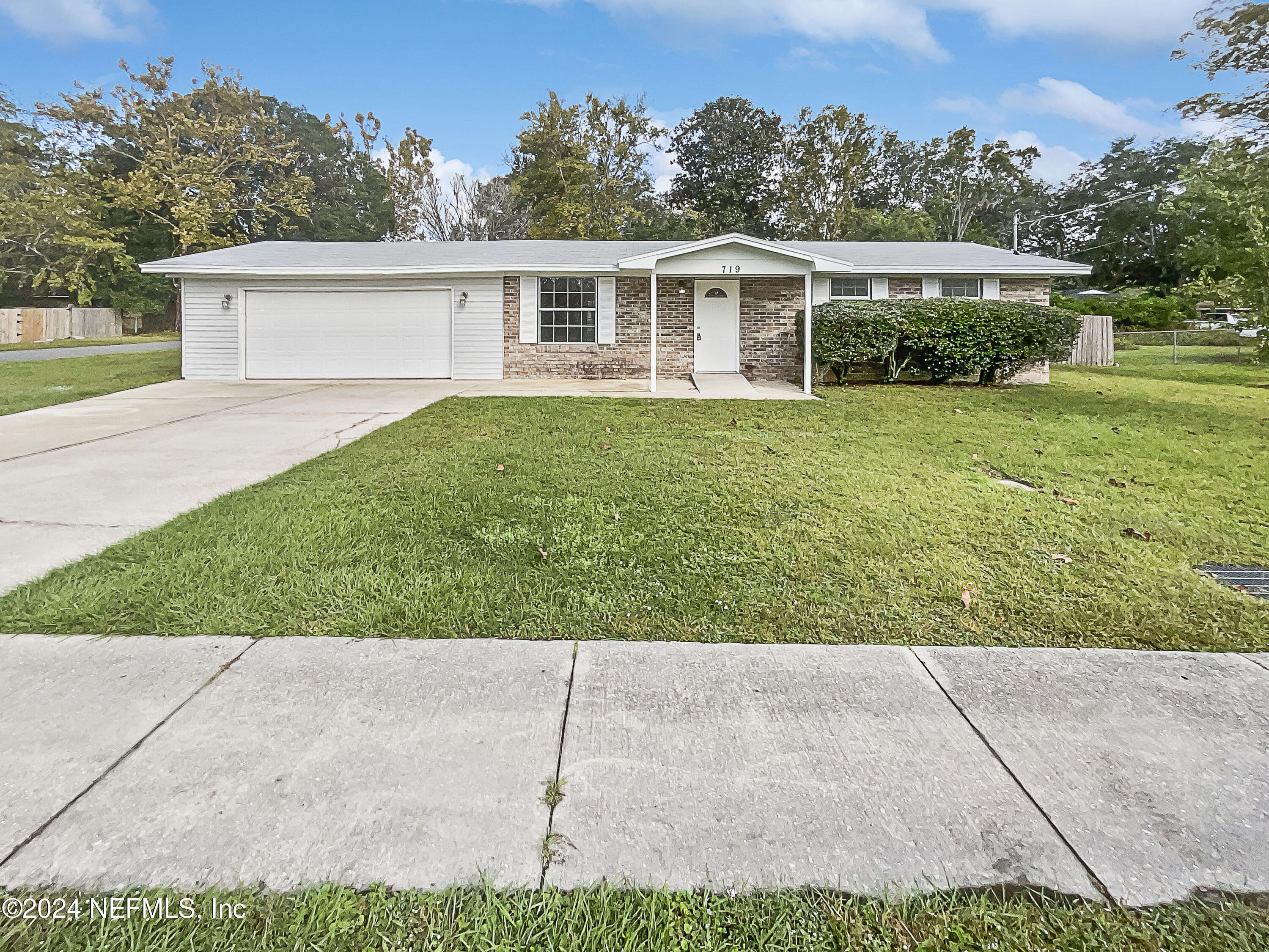 a view front of house with a yard