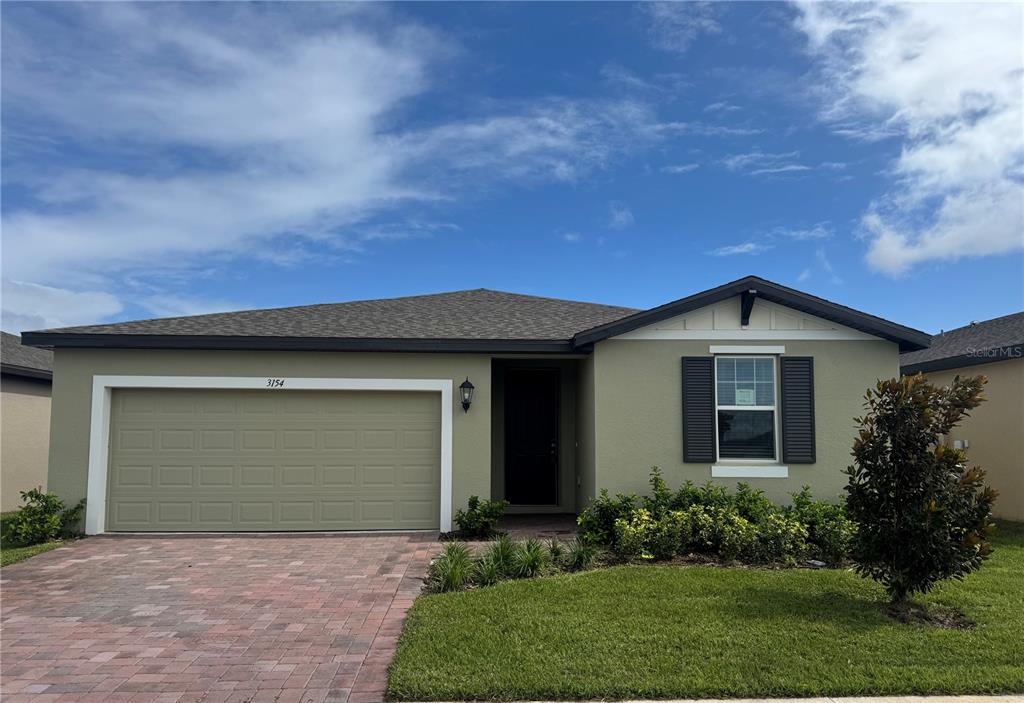 front view of house with a yard