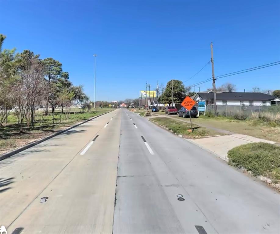 a view of a road from a cars park