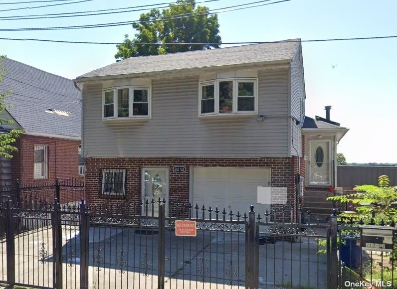 a front view of house along with street