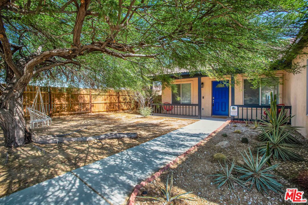 a house with trees in front of it