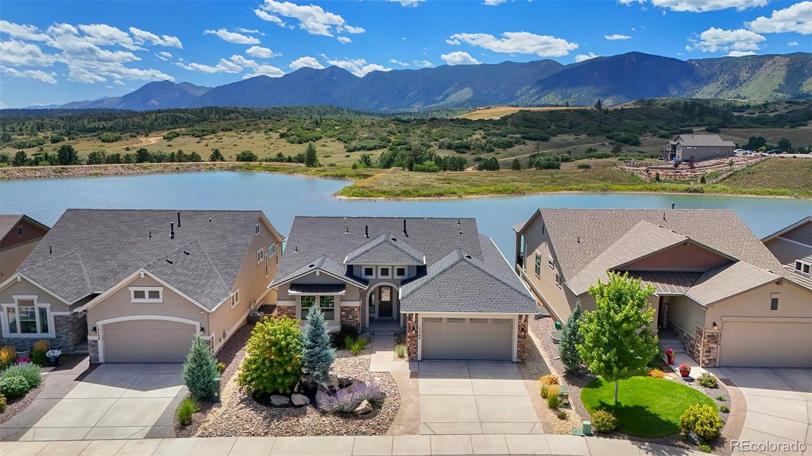 an aerial view of a house with a garden