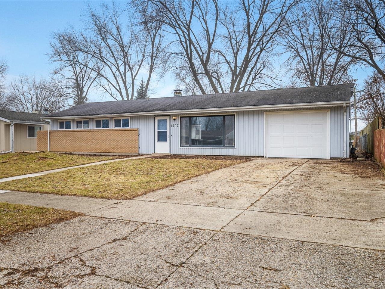 a house with trees in front of it