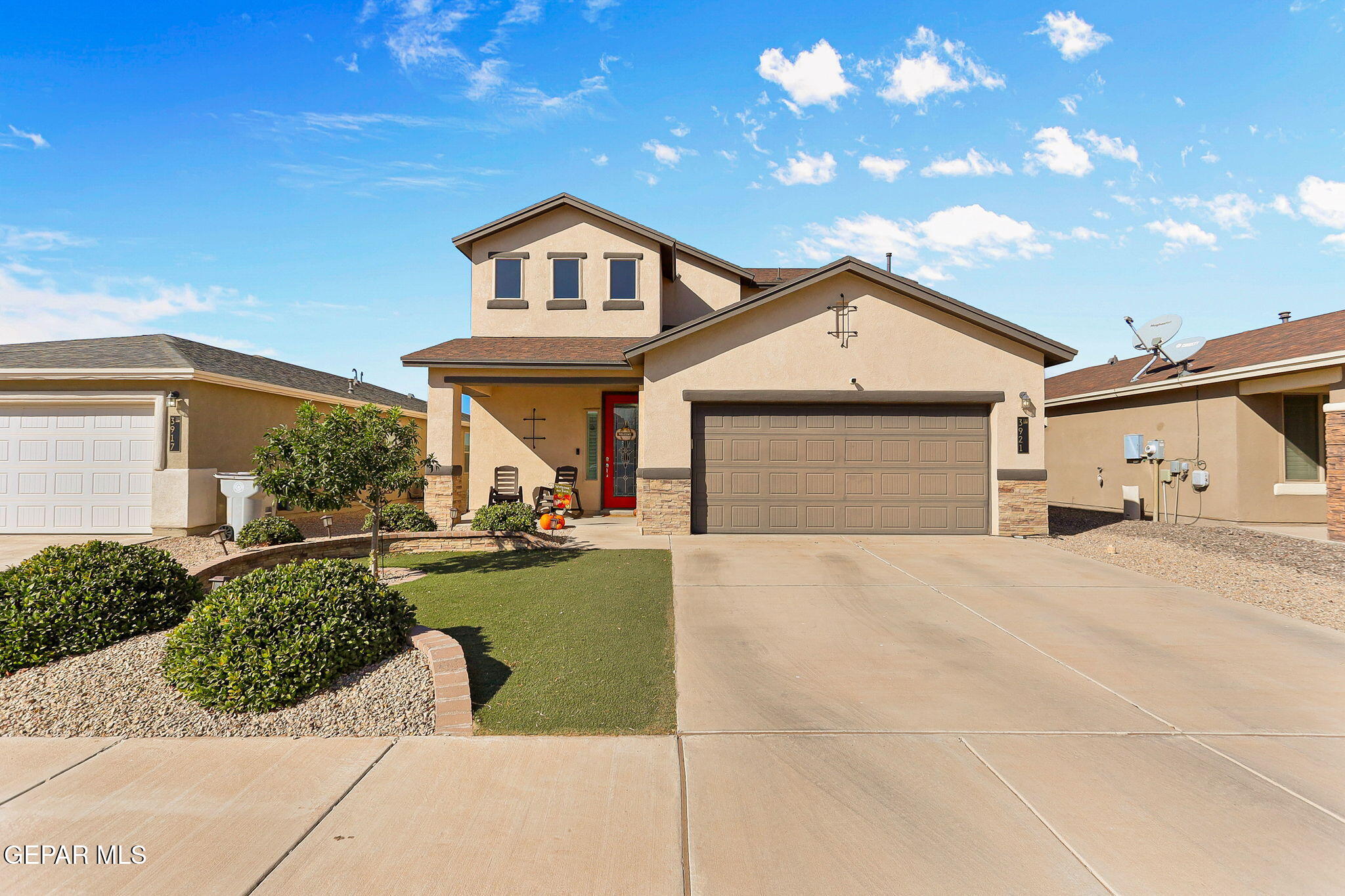 a front view of a house with entertaining space