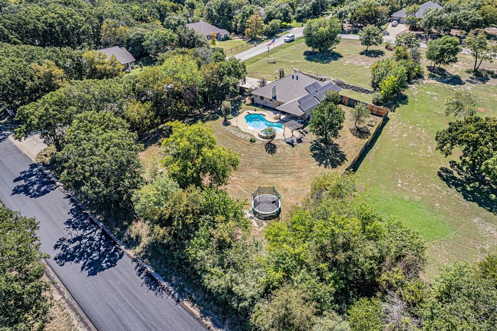 an aerial view of residential house with outdoor space