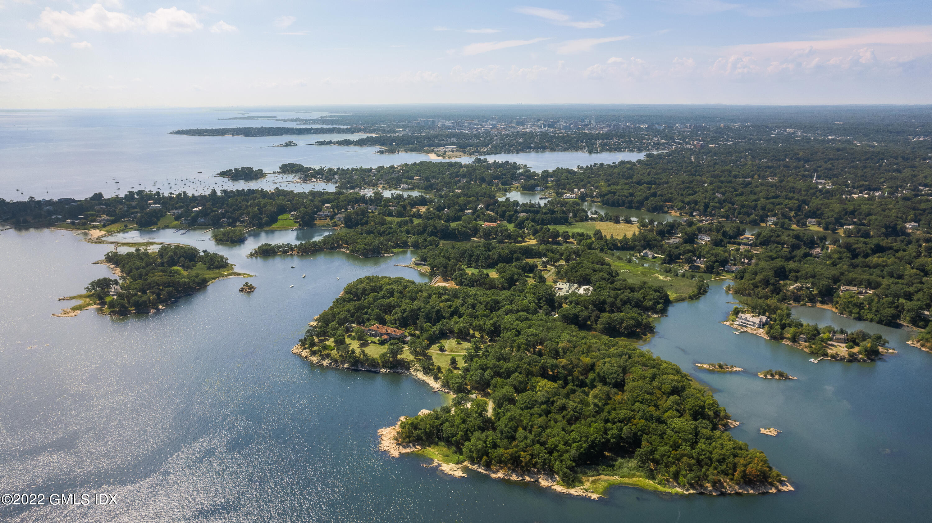 an aerial view of a house with a lake view