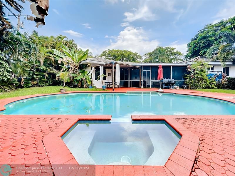 a view of a house with a swimming pool